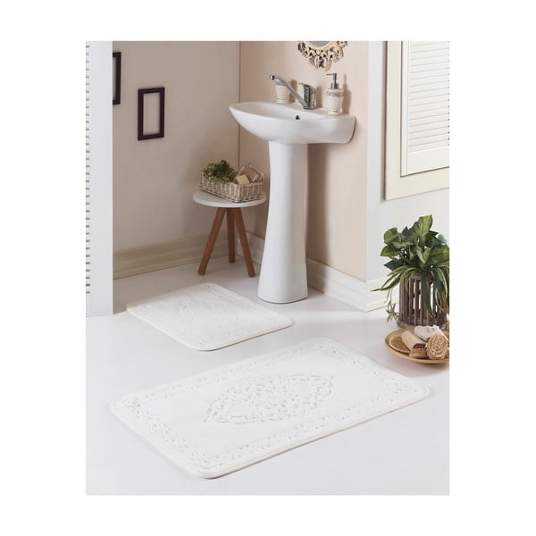 2 kreminės baltos spalvos vonios kambario kilimėlių rinkinys "Osmanli