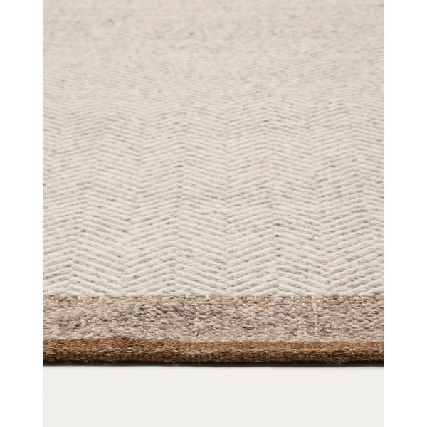 Apverčiamas/rankų darbo iš vilnos kilimas smėlio spalvos 200x300 cm Nifelia – Kave Home-image-2