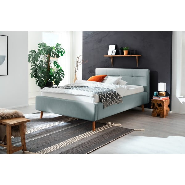 Šviesiai mėlynos spalvos dvigulė lova audiniu dengta su sandėliavimo vieta su lovos grotelėmis 140x200 cm Lotte – Meise Möbel-image-1