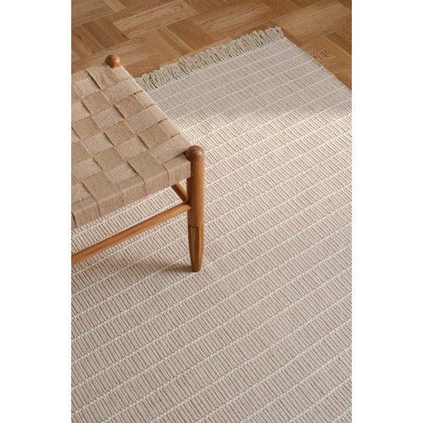 Rankų darbo smėlio spalvos iš medvilnės kilimas 80x150 cm Irma – Jotex-image-1