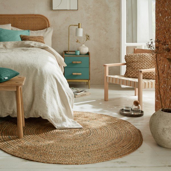 Iš džiuto apvalios formos kilimas mėlynos spalvos/natūralios spalvos ø 133 cm Capri – Flair Rugs-image-1