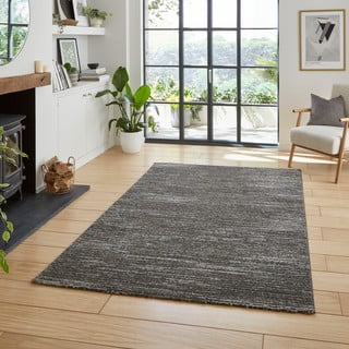 Skalbiamas iš perdirbto pluošto kilimas tamsiai pilkos spalvos 120x170 cm Flores – Think Rugs
