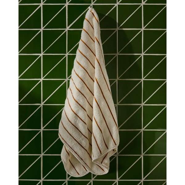 Oranžinės spalvos/smėlio spalvos iš frote audinio iš medvilnės rankšluostis 50x90 cm Dorane – Kave Home-image-1